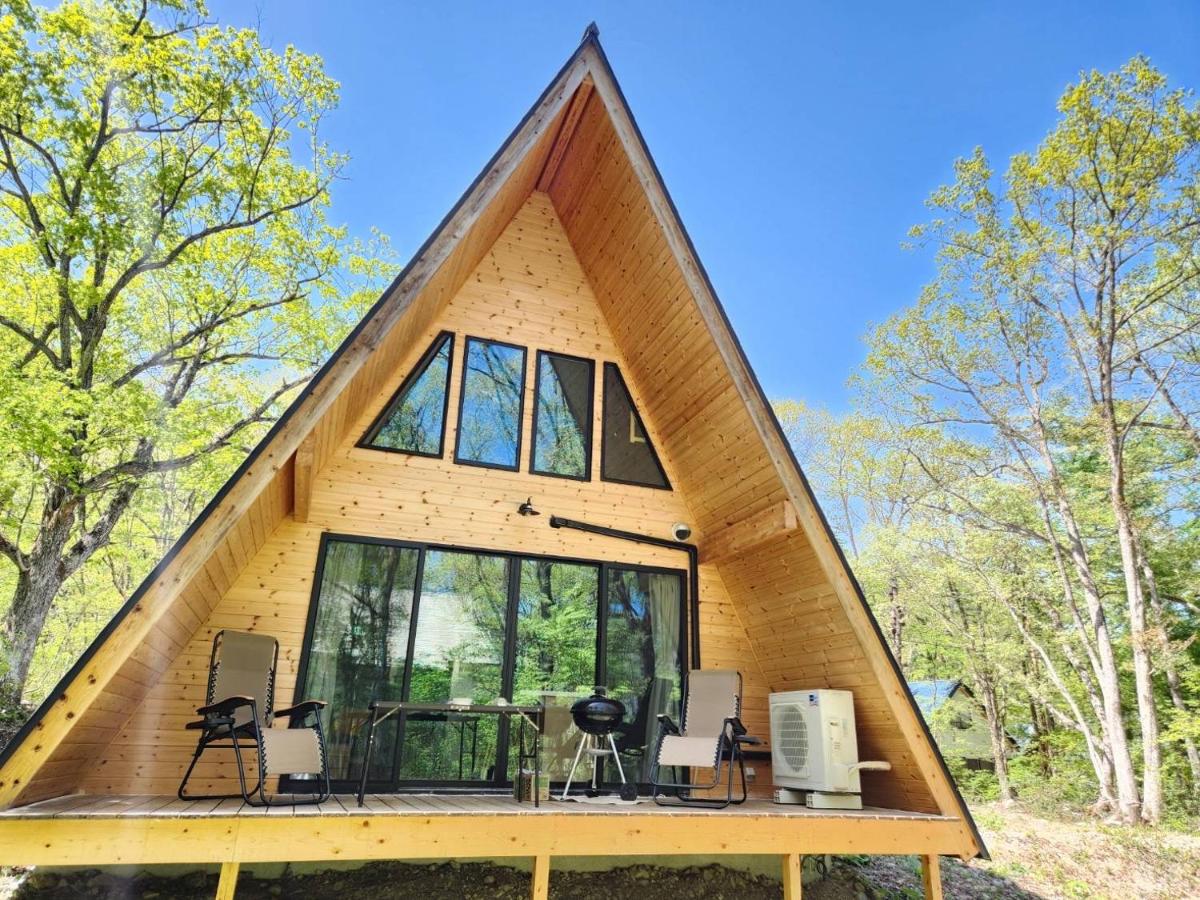 Wooden deck with BBQ summer